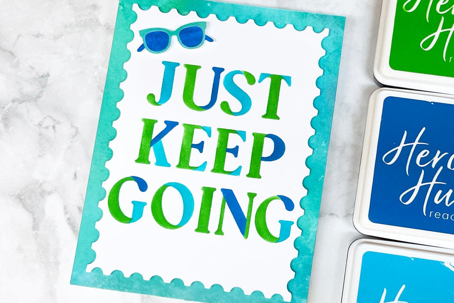 A bold encouraging card that says "Just Keep Going".